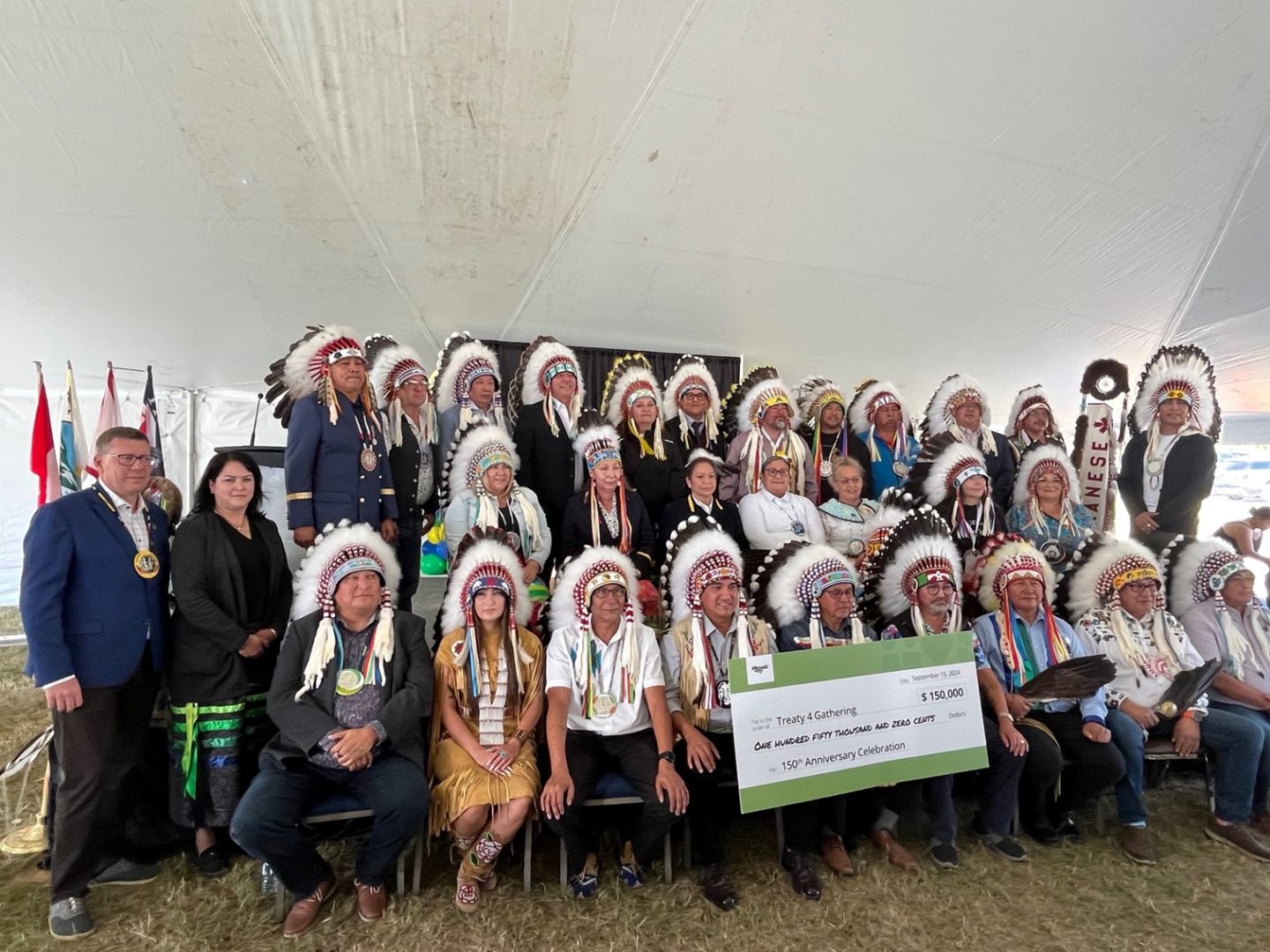 Treaty 4 Chiefs, group photo with Scott Moe and Rhonda Hicks with Mosaic Millenium sponsor cheque at the Treaty 4 Commemoration event on Sunday Sept 15, 2024